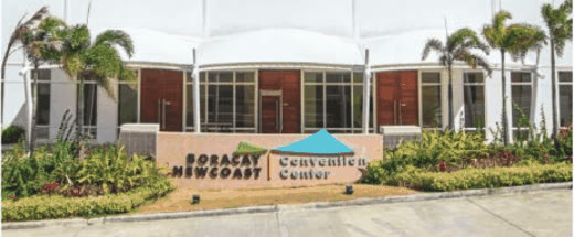 Boracay Newcoast Convention Center entrance with its name sign and gardens
