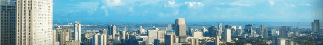 Marco Polo Parkplace residential tower and the Cebu City skyline toward the sea