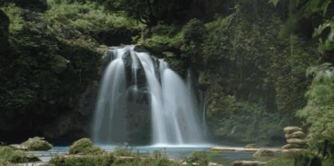 Kawasan Falls cascading into a pool in Badian