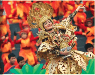 Sinulog festival dancer in gold costume
