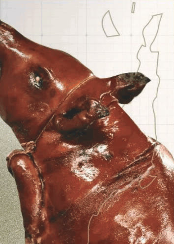 Whole roasted lechon with glossy crisp skin