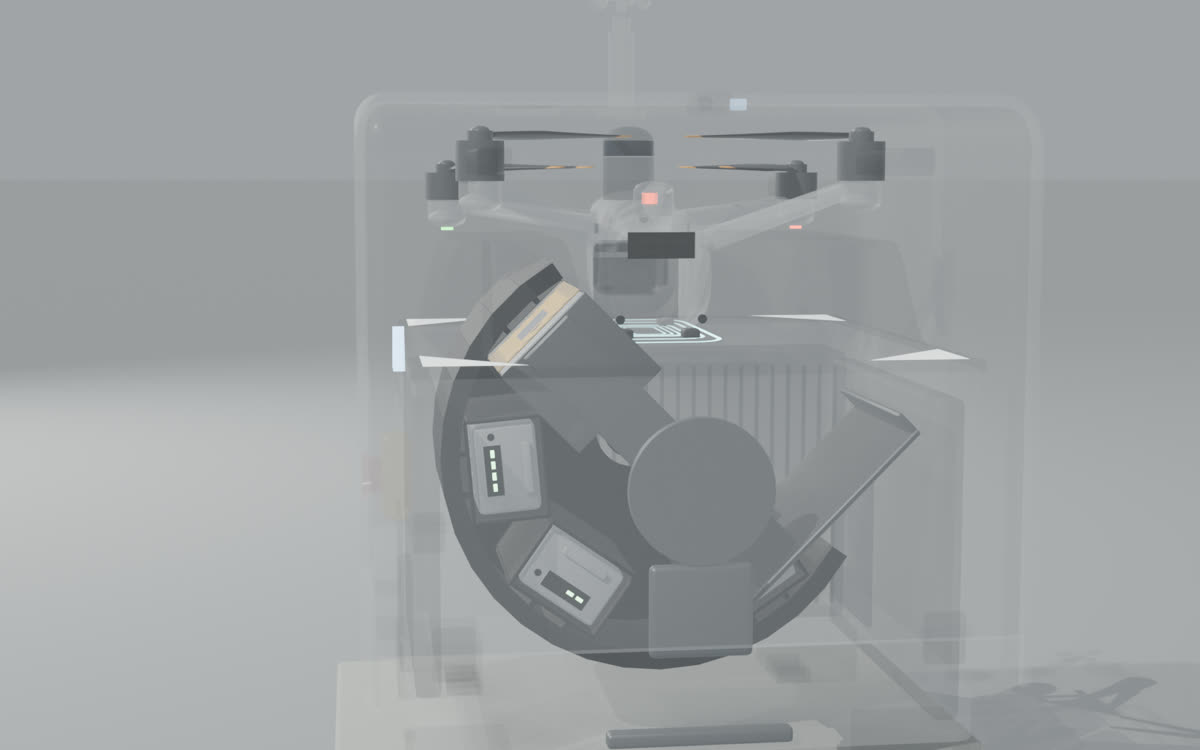 Rear X-ray: the cradle pulls a charged battery from its compartment