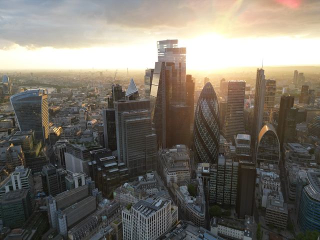 City towers at sunset, drone photo, Jun 2024
