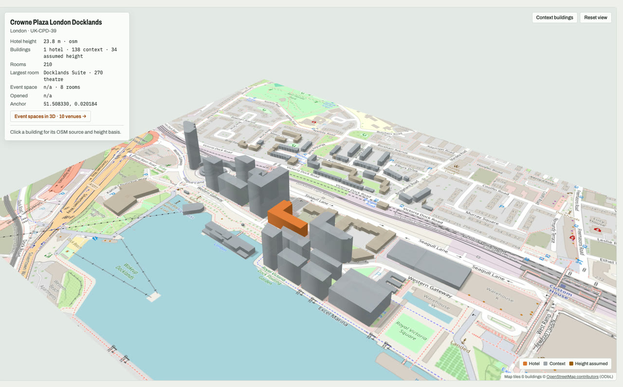 3D massing model of Crowne Plaza London Docklands in London, UK, its tallest building about 24 m: the hotel's buildings in orange among grey neighbouring buildings on an OpenStreetMap street map. Model by Budots Media.