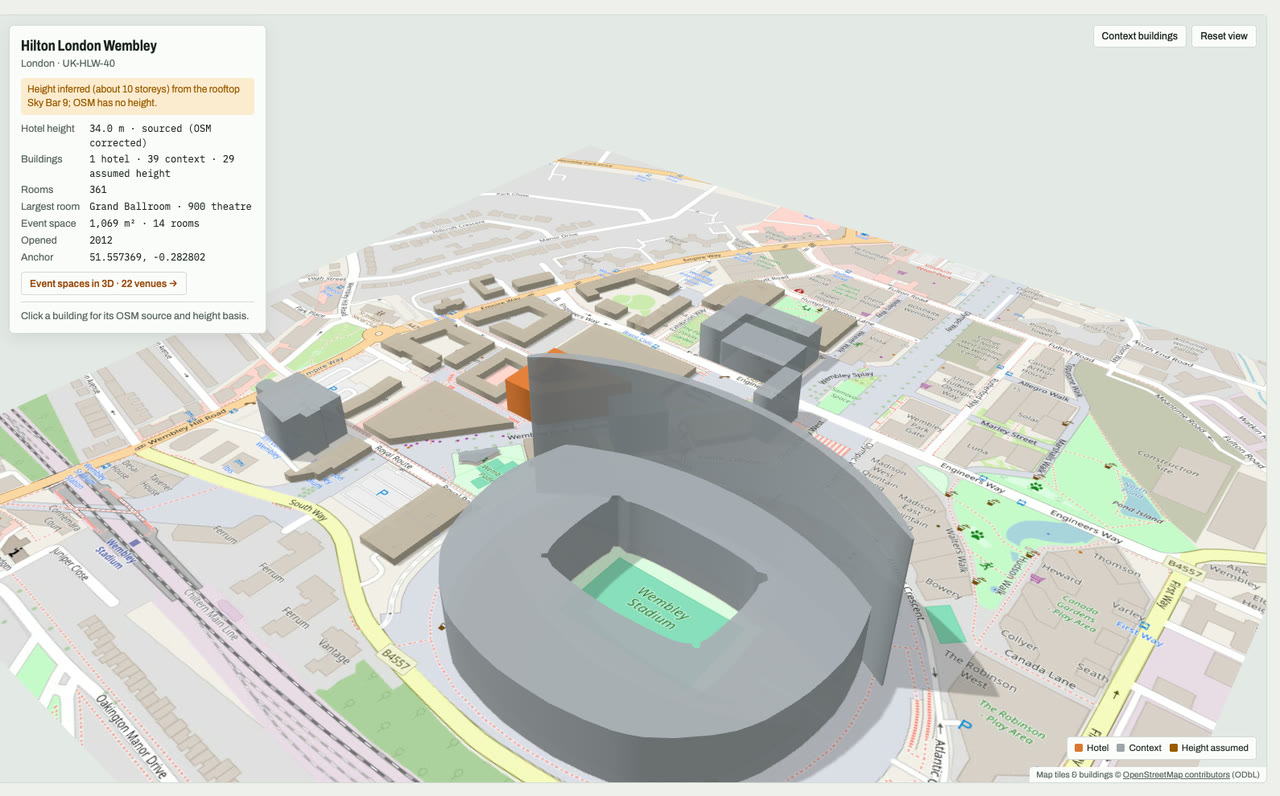 3D massing model of Hilton London Wembley in London, UK, its tallest building about 34 m: the hotel's buildings in orange among grey neighbouring buildings on an OpenStreetMap street map. Model by Budots Media.