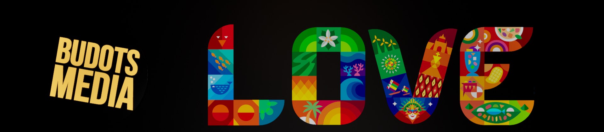 A dark stage with a glowing multicoloured LOVE sign and an orange Budots Media sign on the back wall